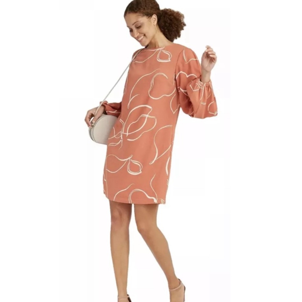 Elegant Coral Dress with White Floral Design